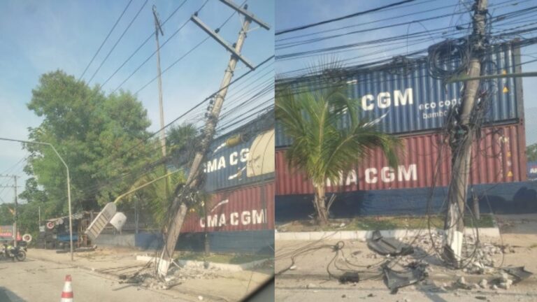 Poste fica pendurado por fios após ser atingido por carro, em Manaus