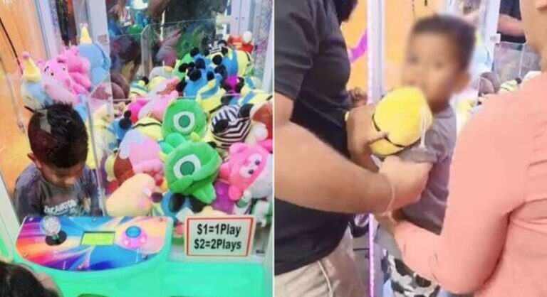 Criança fica presa em máquina de pelúcia ao tentar alcançar brinquedo Criança fica presa em máquina de pelúcia ao tentar alcançar brinquedo