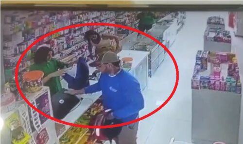VÍDEO: Casal se passa por cliente e assalta drogaria, em Manaus