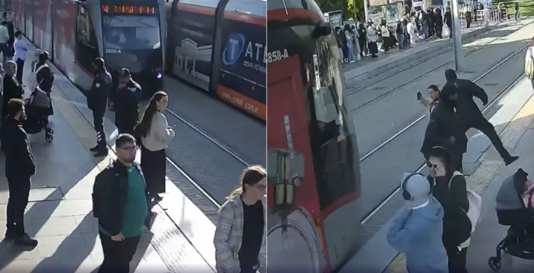 Segurança salva mulher de ser atropelada por trem na Turquia Segurança salva mulher de ser atropelada por trem na Turquia