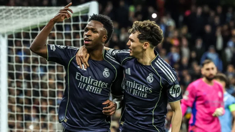 Real Madrid vence City e avança às quartas da Champions com dois gols de Vini Jr